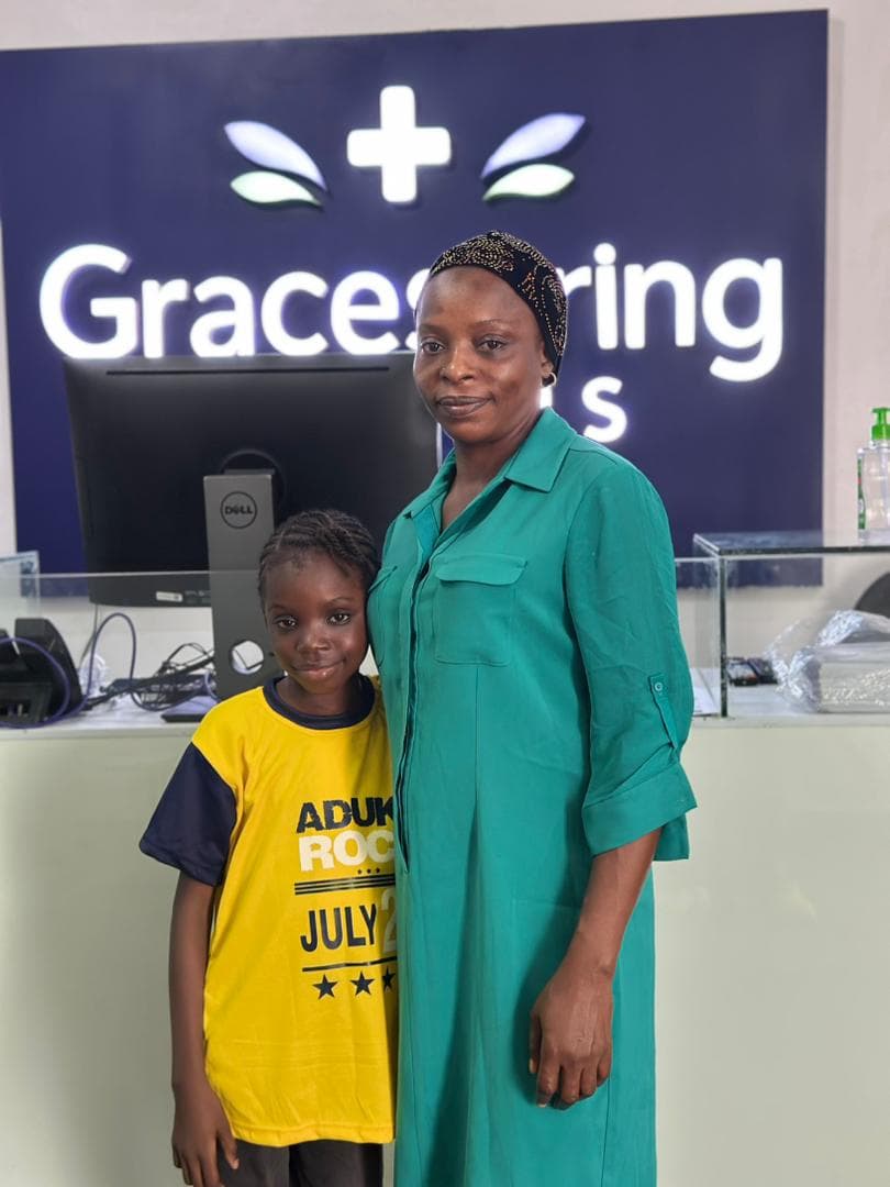 Patient posing in a yellow shirt